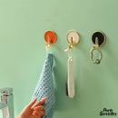 Crochet adhésif porte serviette