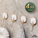 Crochet adhésif porte serviette