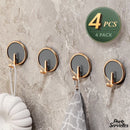 Crochet adhésif porte serviette