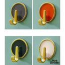 Crochet adhésif porte serviette