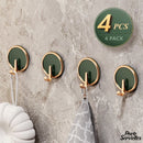 Crochet adhésif porte serviette