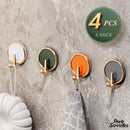 Crochet adhésif porte serviette