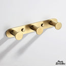 Porte serviette mural doré