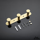 Porte serviette mural doré