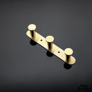 Porte serviette mural doré