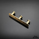 Porte serviette mural doré