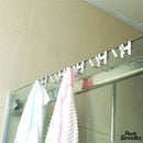 Porte serviette pour paroi de douche